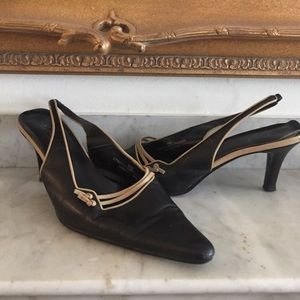 Size 10 sling backs, black with tan trim.