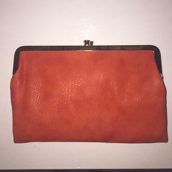 South moon under orange clutch - Picture 1 of 3