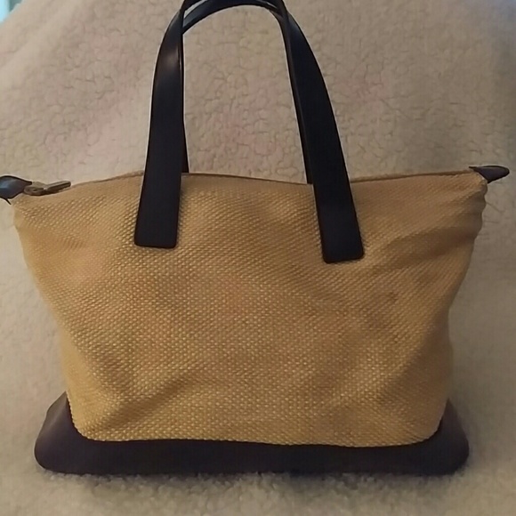 FURLA straw and patent leather satchel.