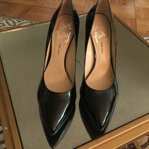 Size 9 black patent leather Nine West pumps.
