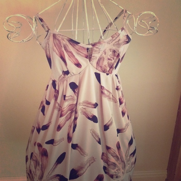 Slip dress with feather pattern