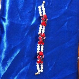 Handmade red and white flower garden bracelet.