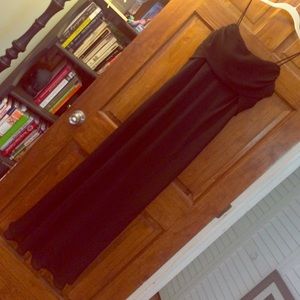 Spaghetti strapped long black dress.