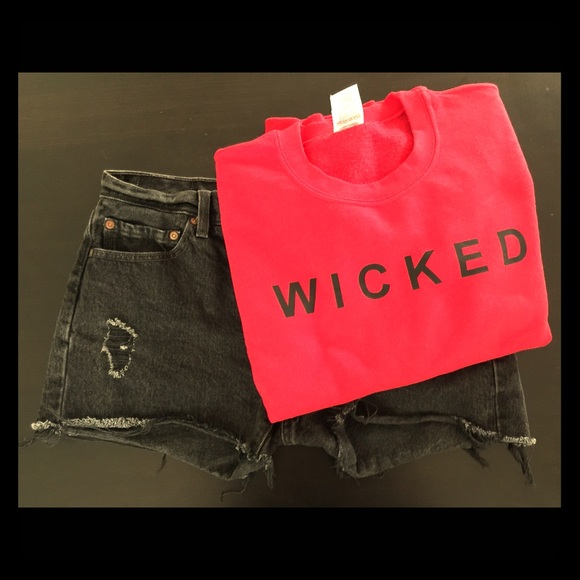 Levi's low waist destroyed denim shorts.