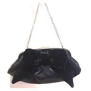 Satin evening bag with velvet bow