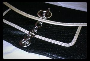 BCBG handheld clutch