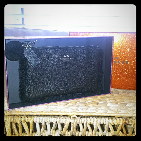 Coach Handbags - Authentic COACH Shearling Wristlet in black