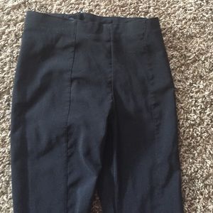 Black high waisted, skinny, dress pants.