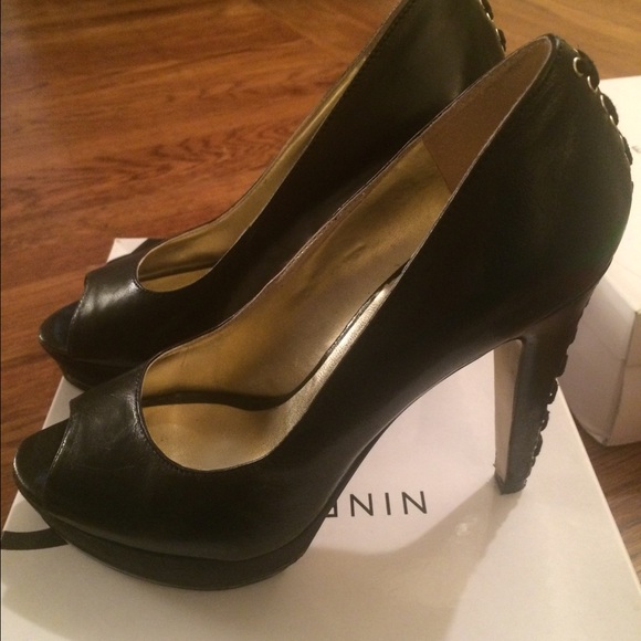 Nine West black leather heels. Worn twice.