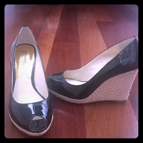 Black patent Michael Kors peep top wedges