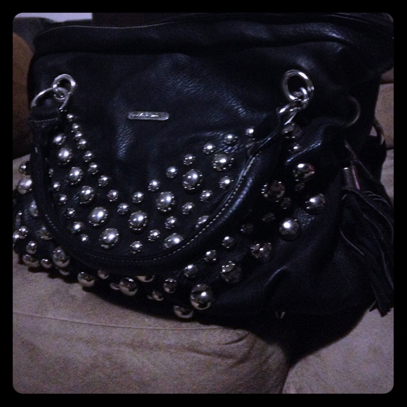 Leather Ruslic Coutures bag
