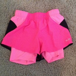 Pink and black athletic shorts