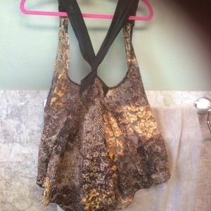 Open front multi color lace vest from the Buckle