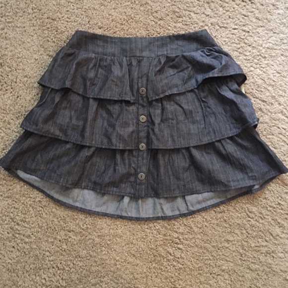 A ruffled dark skirt
