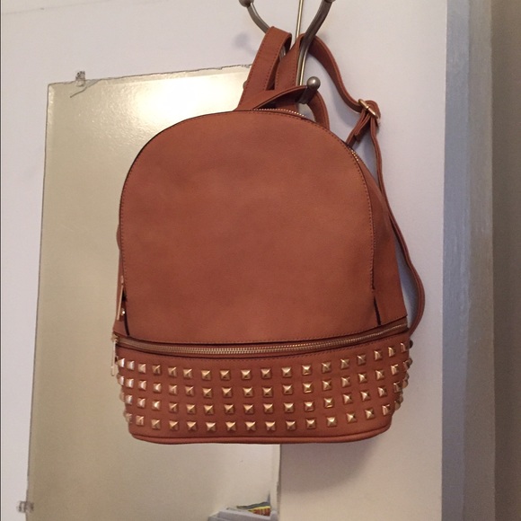 Brand new studded glamorous book bag very roomy.