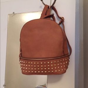 Brand new studded glamorous book bag very roomy.