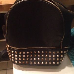 Brand new studded glamorous book bag very roomy.