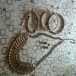 Bundle of gold necklace and bracelets and hoops