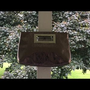 Authentic MK Clutch purse. Metallic Gray