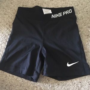 Black nike pros on hold