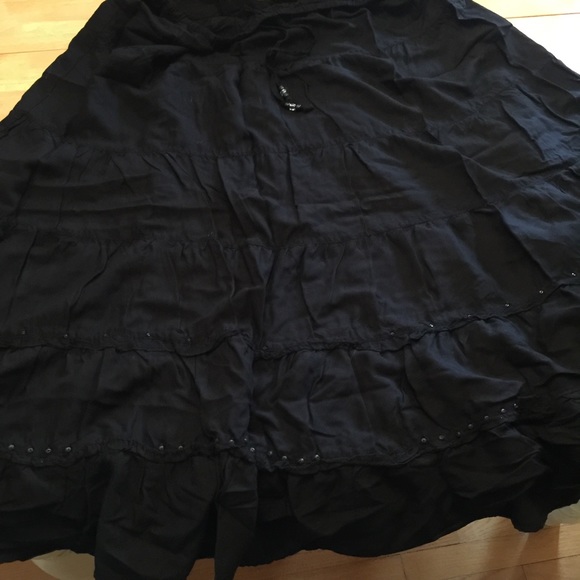 Long black skirt.