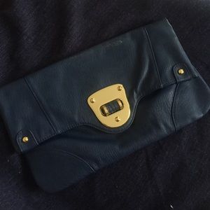 Navy blue follower clutch bag