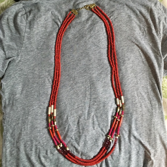 Distressed, multi strand necklace.