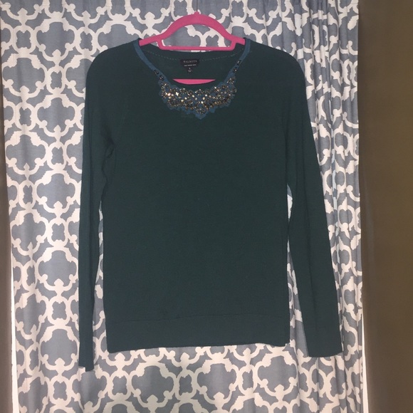 Green sweater with jeweled detail