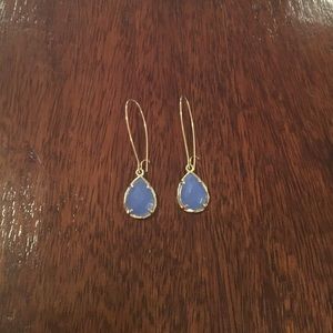 Periwinkle and gold Kendra Scott earrings.