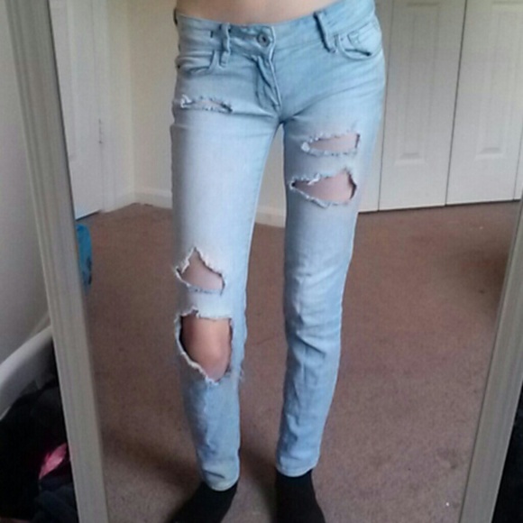 Destroyed light wash skinny jeans