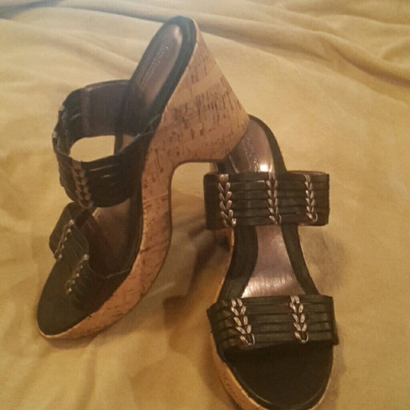 Black with cork wedge.