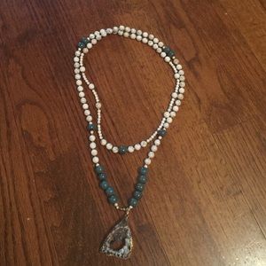 Long blue and white geo stone necklace.