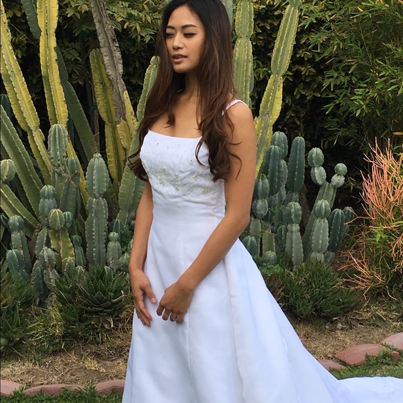 Organza white by Monique Luo. Never before worn.