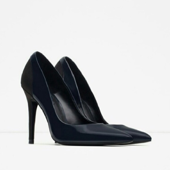 Blue leather and black suede pumps