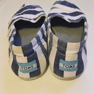 Striped TOMS slip ons