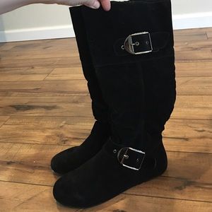 Black winter boots with rhinestone buckles