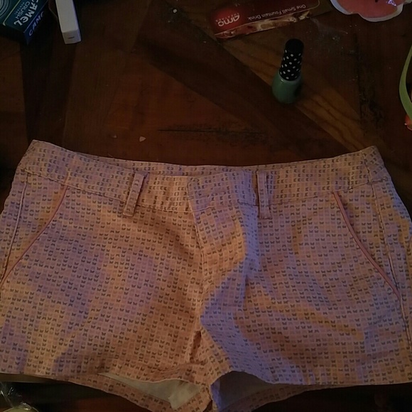 Pink butterfly jean shorts