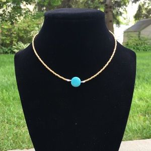 Gold choker with turquoise circle stone