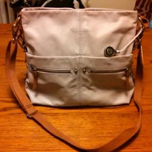 Pale lilac The Sak purse
