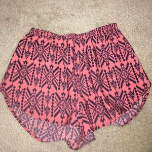 Red and black flowy shorts with elastic waist