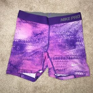 Purple patterned Nike pros