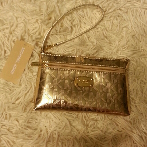 Gold MK jet set wristlet