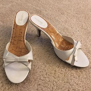 White peep toe heels with bow on the front!