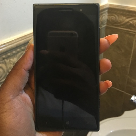 Black AT&T Nokia touch screen phone.