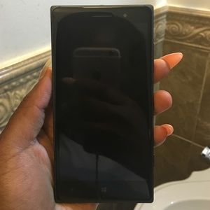 Black AT&T Nokia touch screen phone.
