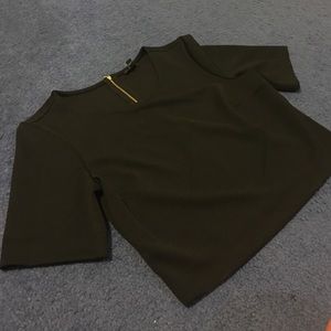 Black express crop top with gold zipper