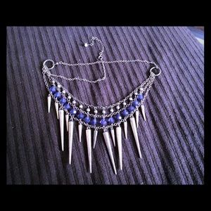 Choker-length golden and indigo necklace