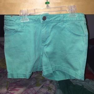 greenish teal shorts