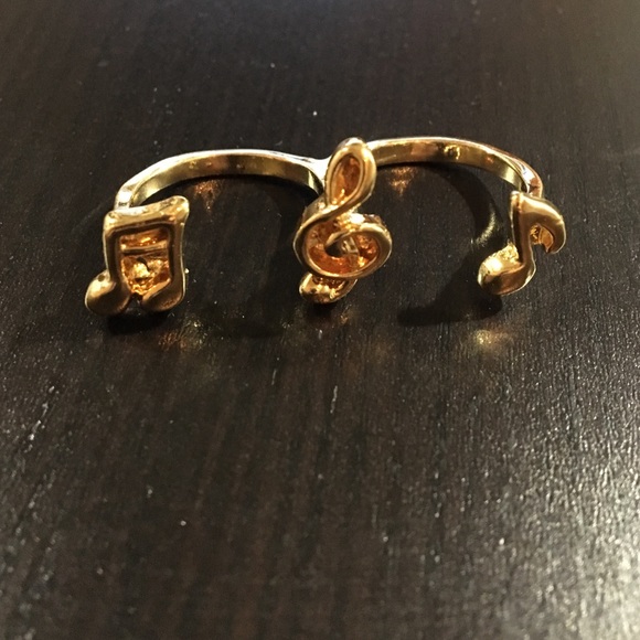 Two finger gold notes ring