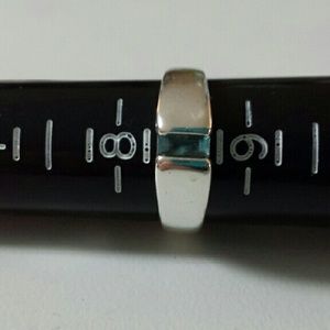 Retired James Avery Meridian ring with blue topaz